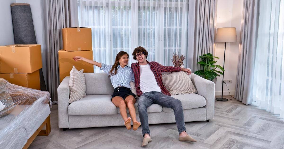 happy couple on couch