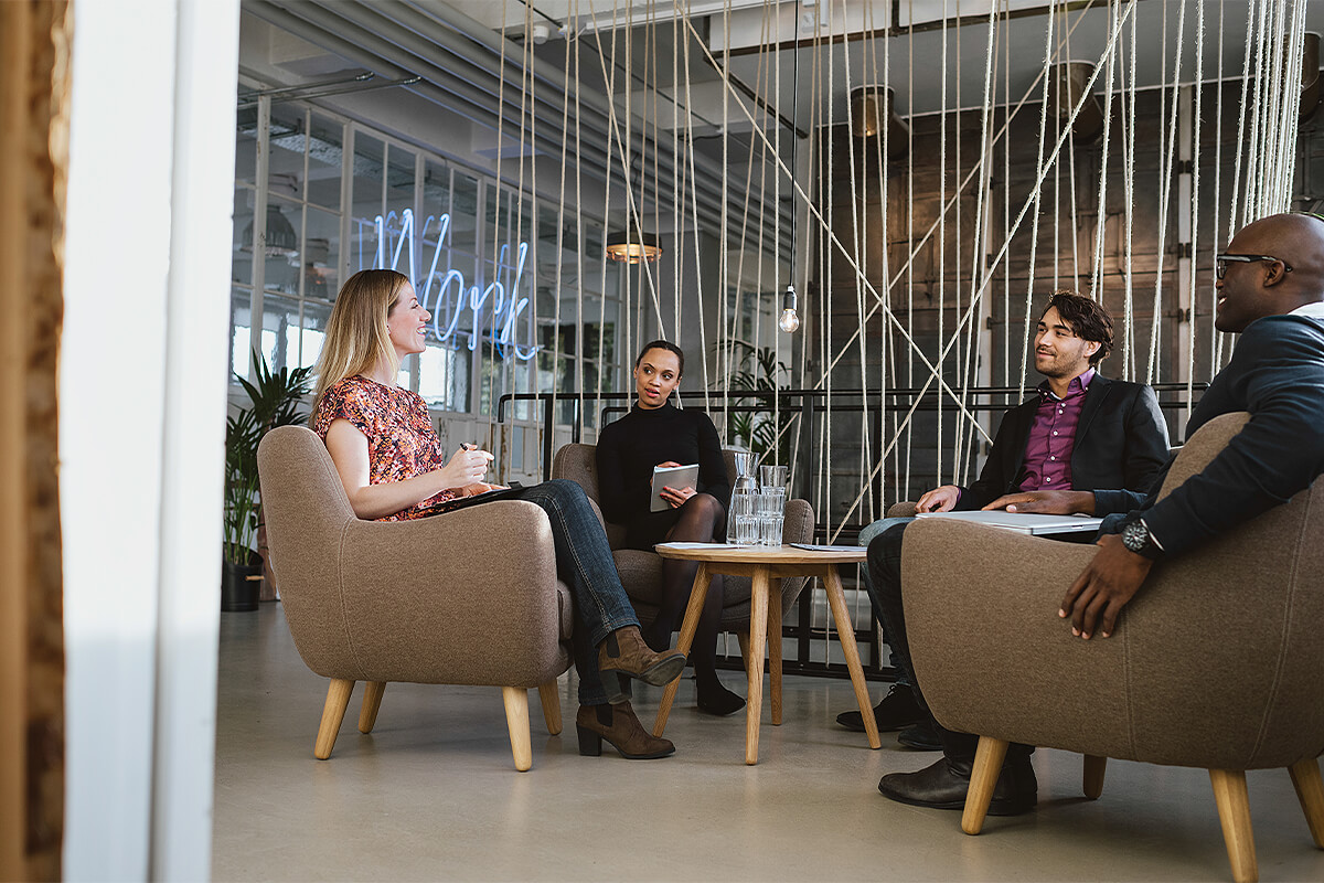 Office workers discussing plans